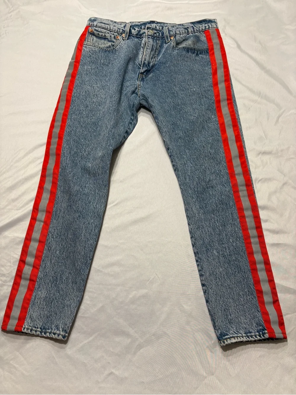 Levi's Light Blue Denim Jeans with Red Side Stripes
